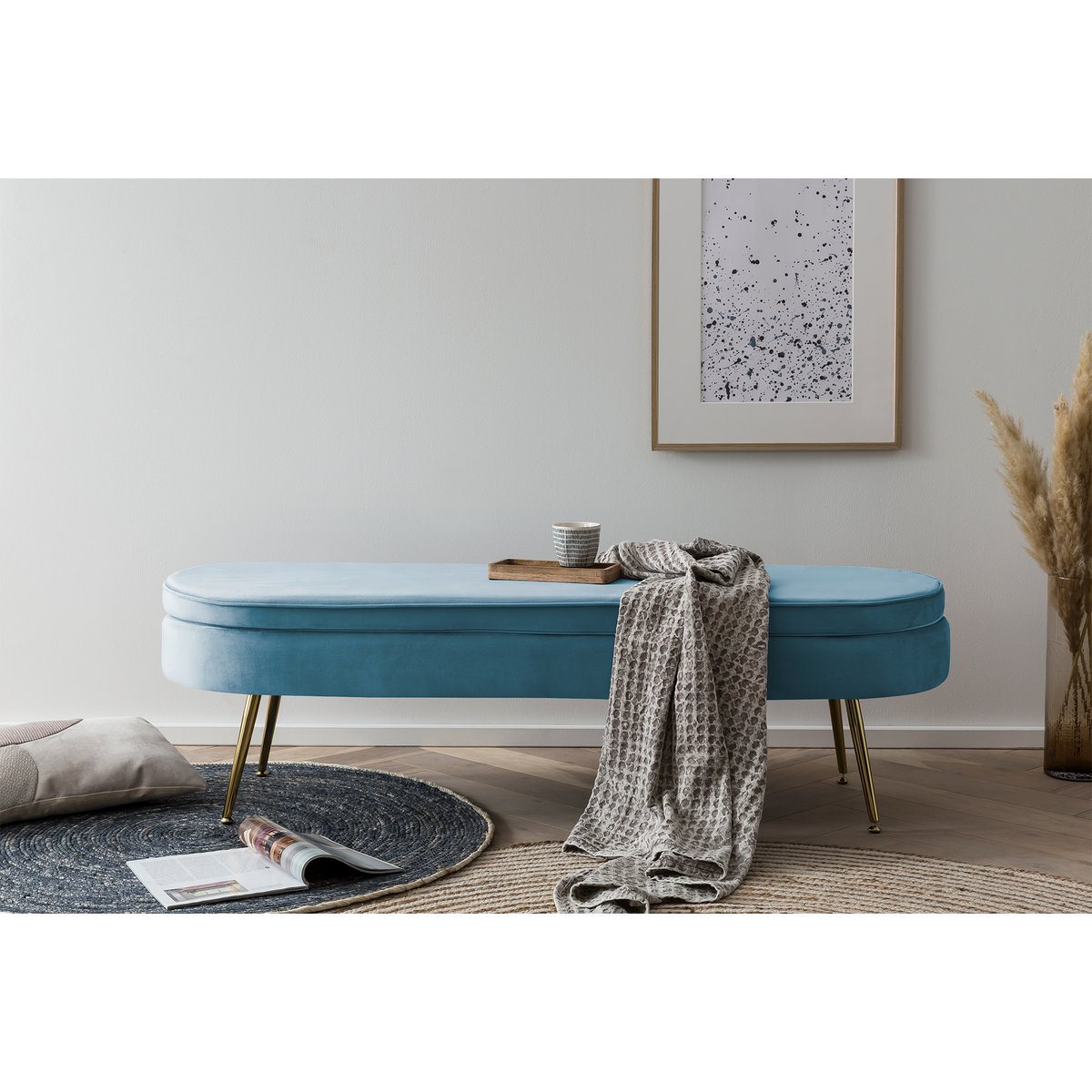 Pouf oval long made of blue velvet