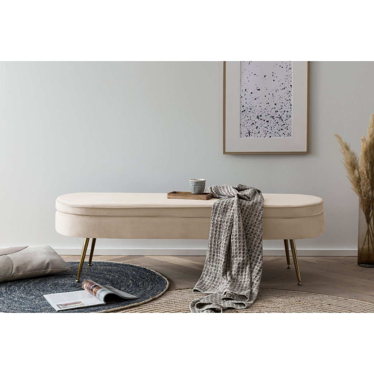 Pouf oval long made of beige velvet