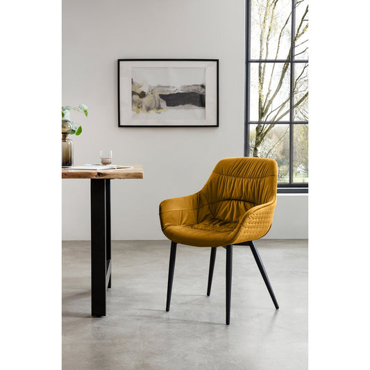 Armchair with honeycomb quilting in mustard yellow velvet