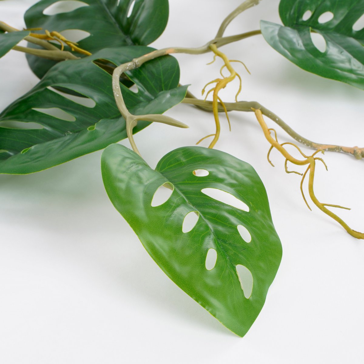 Künstliche Pflanzengirlande Monstera – L115 x B34 x H10 cm – Grün