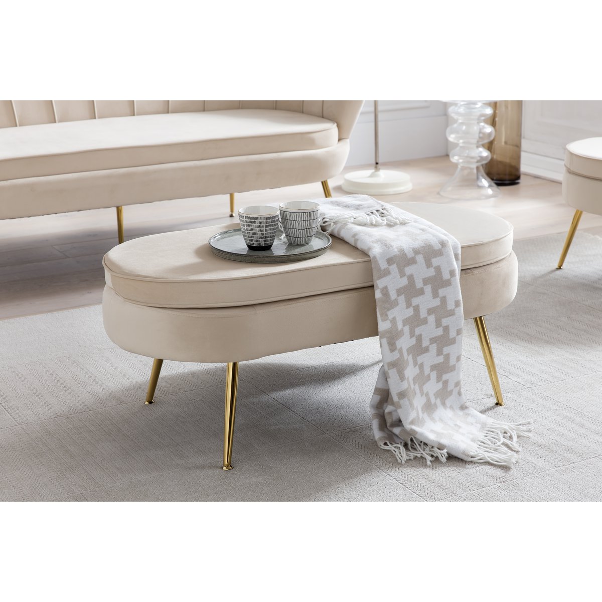 Pouf oval made of beige velvet