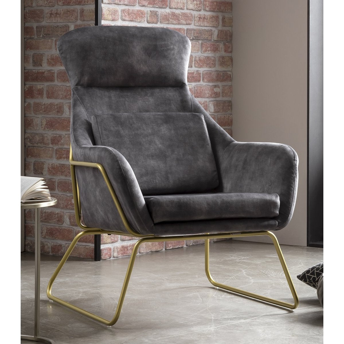 Lounge chair made of gray velvet