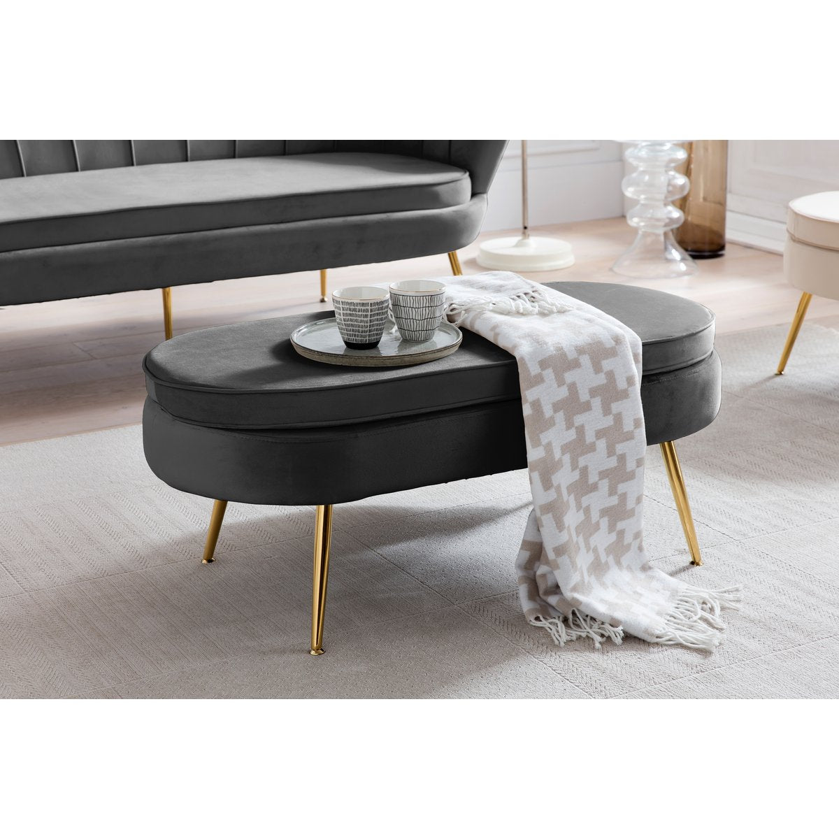 Black velvet oval pouf