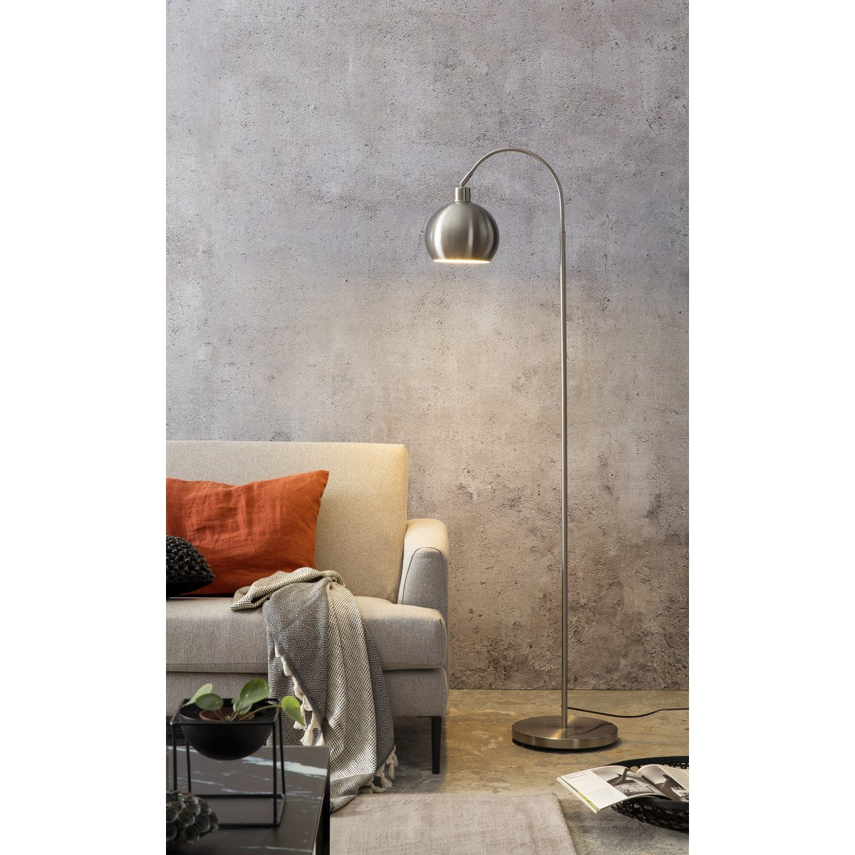 Floor lamp made of metal with a stainless steel finish