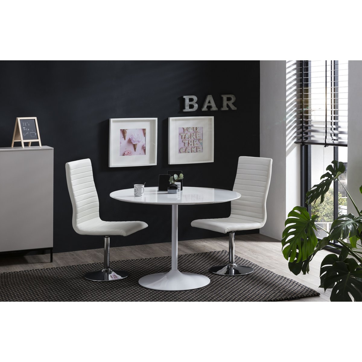 Set of 4 dining chairs in white imitation leather look