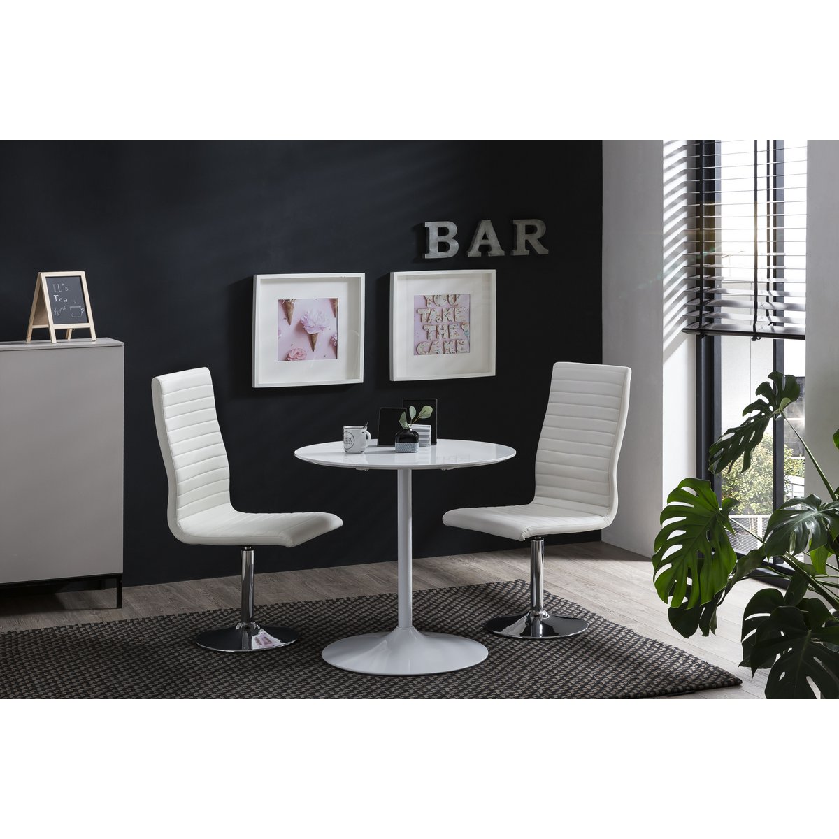 Set of 4 dining chairs in white imitation leather look