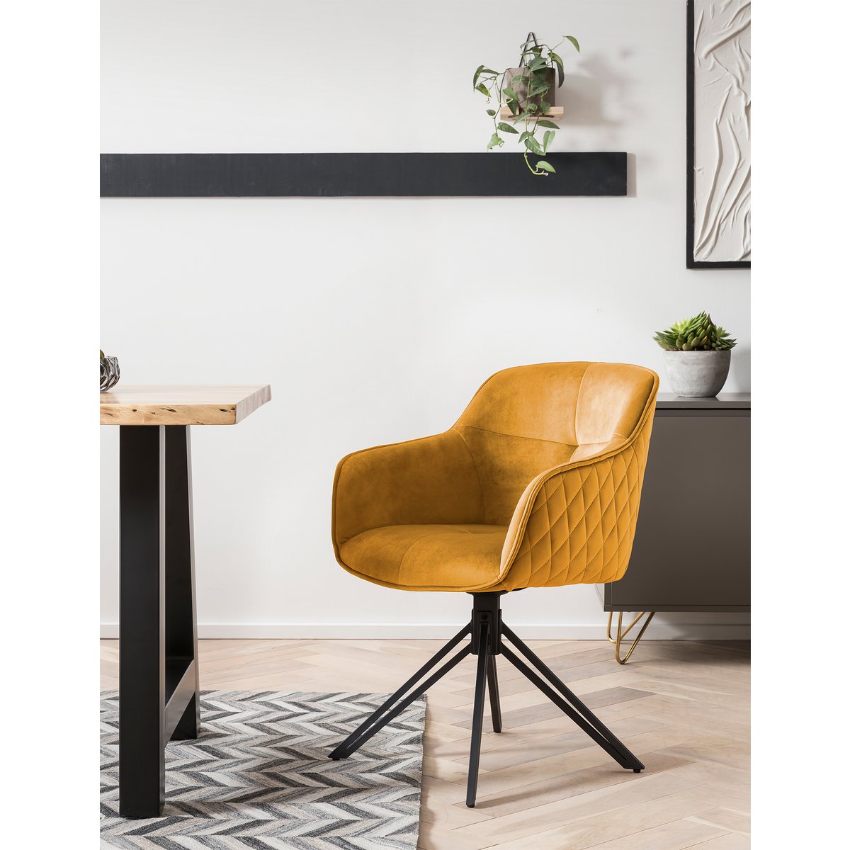 Armchair with yellow honeycomb quilting