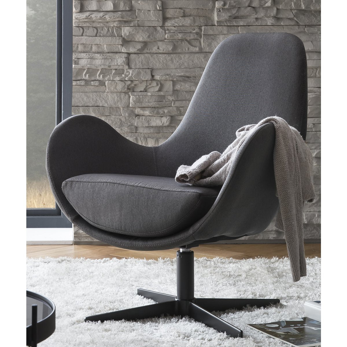 Armchair with swivel function