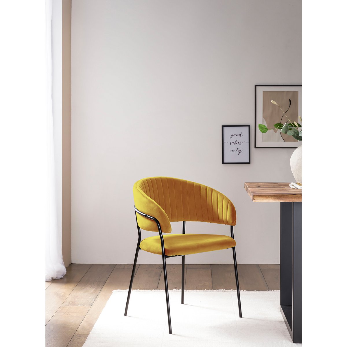 Yellow velvet chair with quilted back